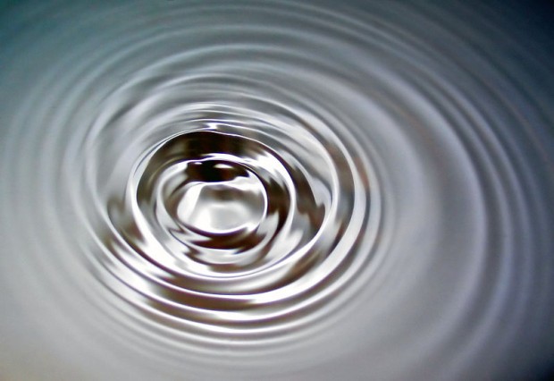 Surface tension waves traveling through water. From wikipedia.